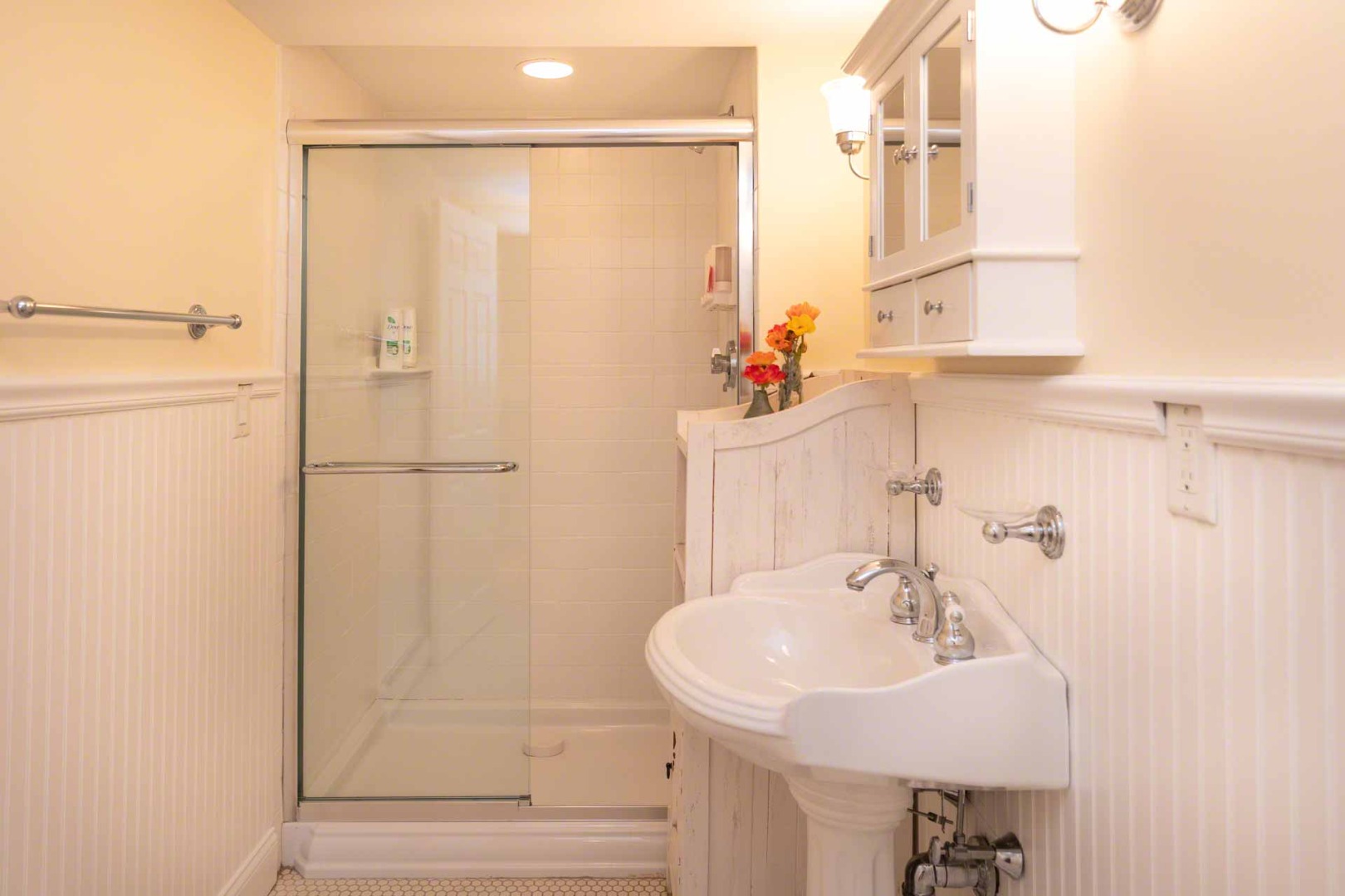 63 Norton Orchard Road Edgartown, MA 02539 - Photo 23 of 43 a bathroom with a sink and a mirror