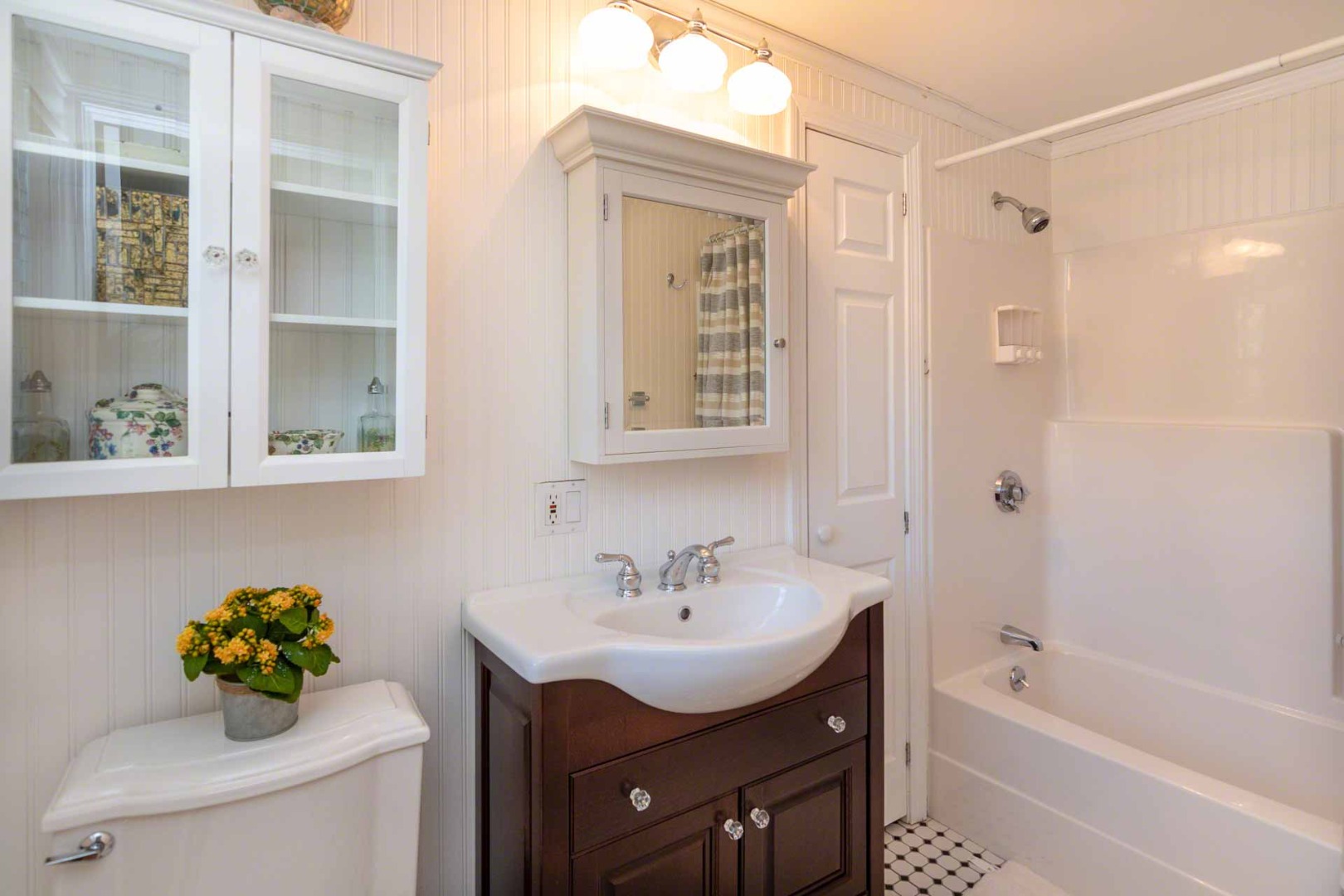 63 Norton Orchard Road Edgartown, MA 02539 - Photo 29 of 43 a bathroom with a sink toilet and shower