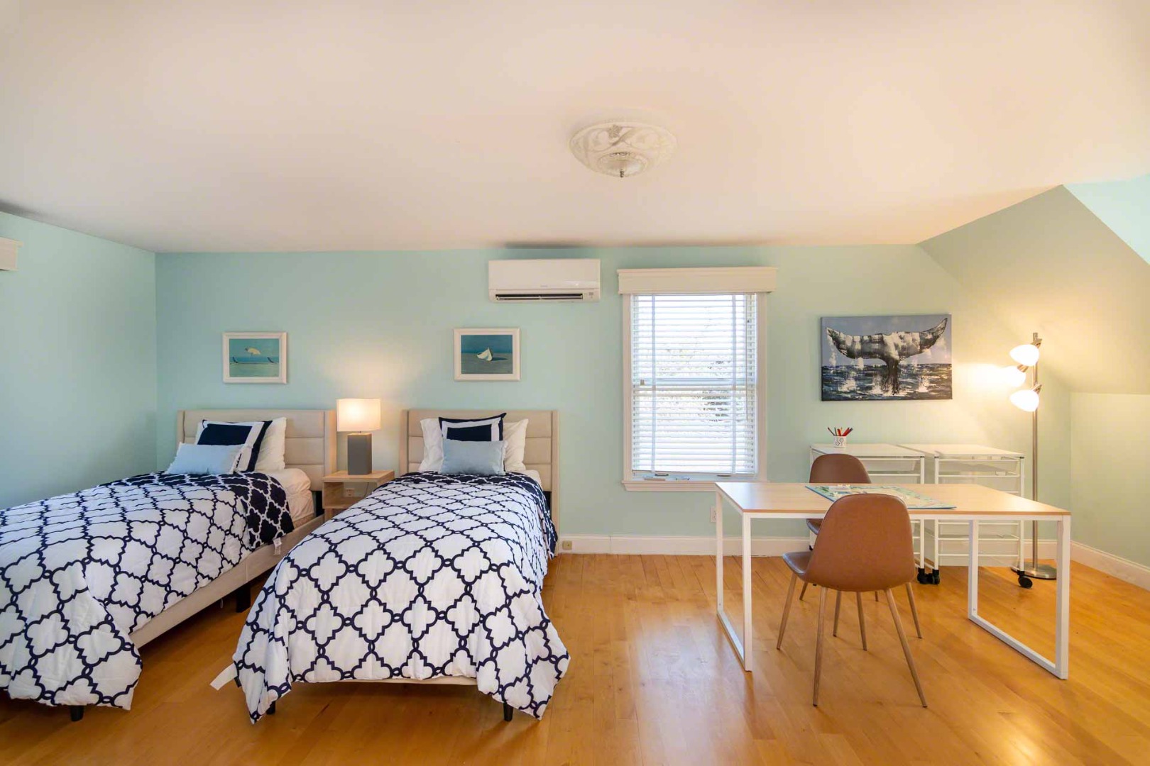 63 Norton Orchard Road Edgartown, MA 02539 - Photo 31 of 43 a bedroom with furniture and wooden floor