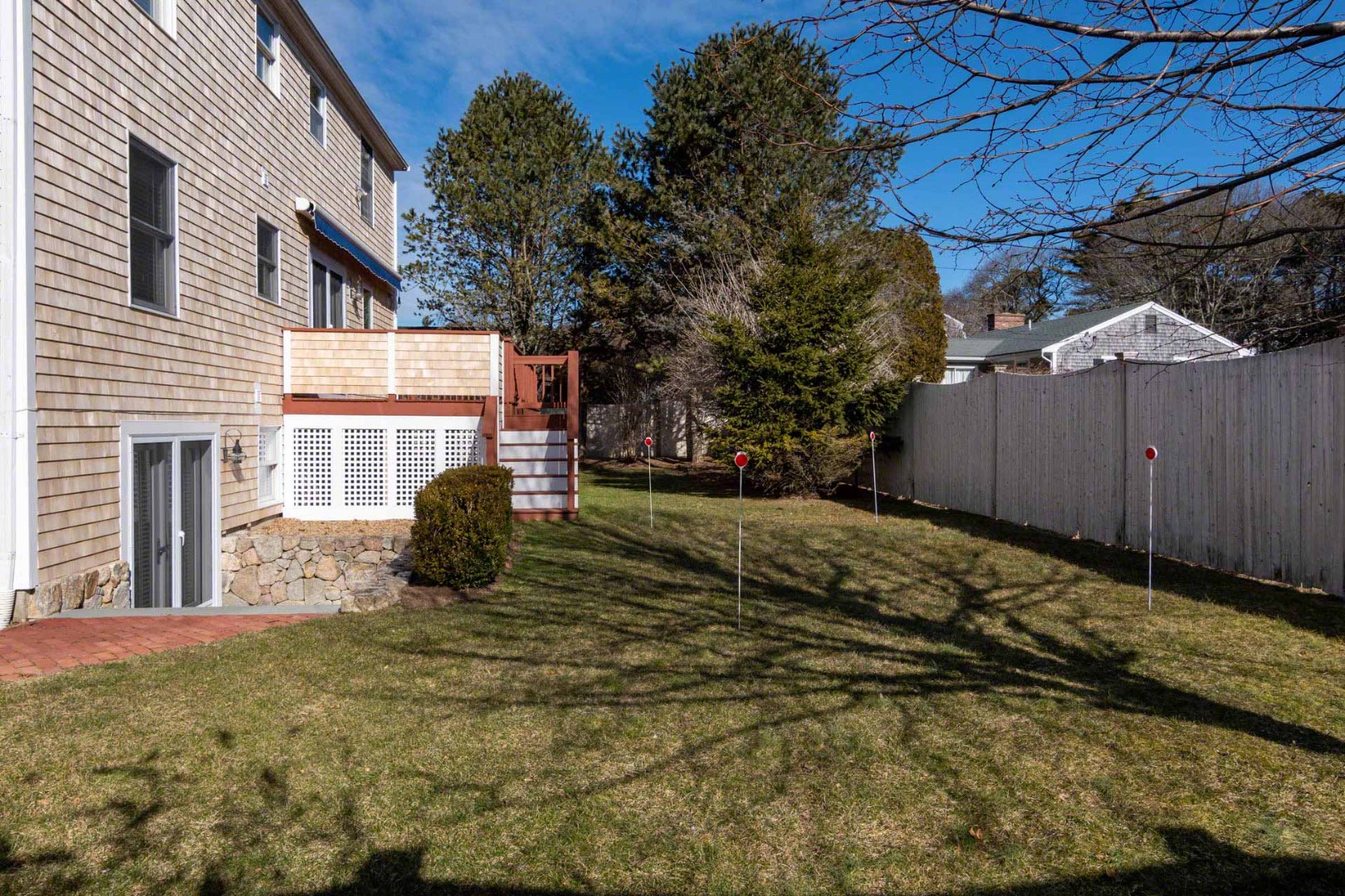 63 Norton Orchard Road Edgartown, MA 02539 - Photo 40 of 43 a view of a house with a yard