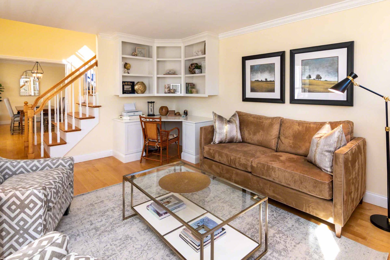 63 Norton Orchard Road Edgartown, MA 02539 - Photo 5 of 43 a living room with furniture a rug and a wall painting