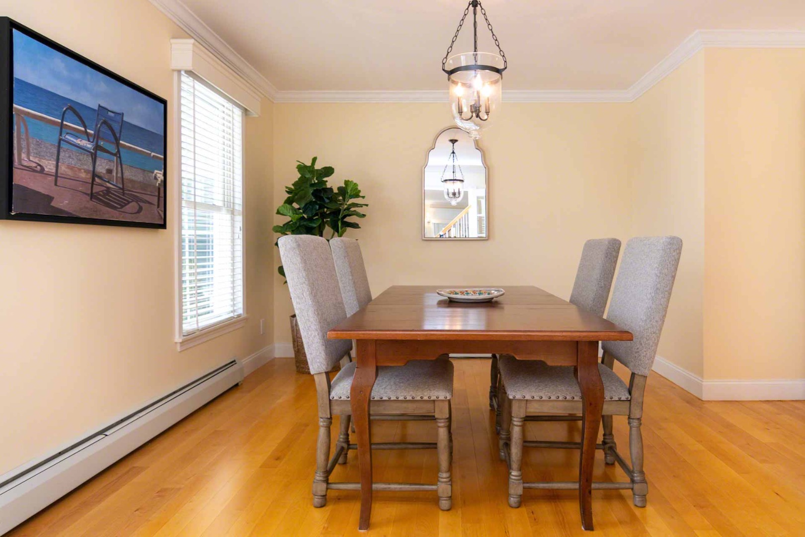 63 Norton Orchard Road Edgartown, MA 02539 - Photo 7 of 43 a view of a dining room with furniture and wooden floor