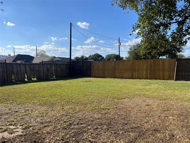 a swimming pool with a yard