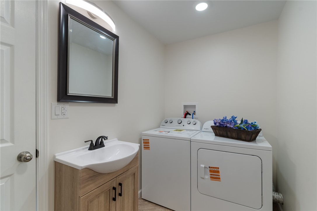 52 State Street Sodus, NY 14551 - Photo 12 of 29 THE HALF BATH/ LAUNDRY ROOM LOCATED ON THE FIRST F
