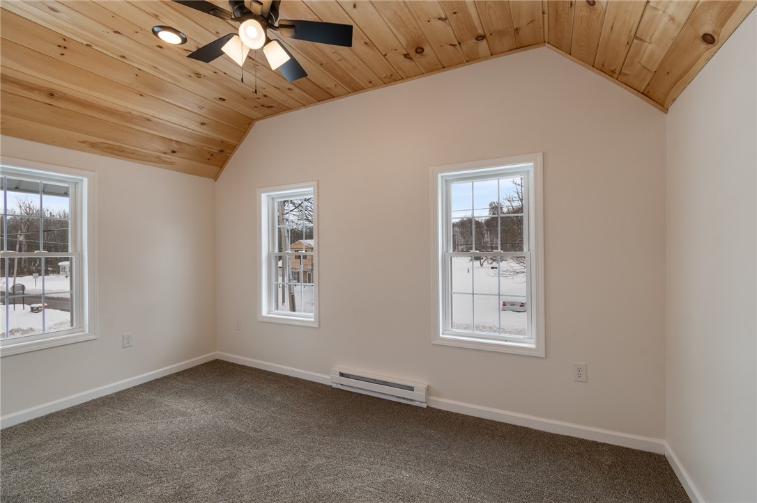 52 State Street Sodus, NY 14551 - Photo 18 of 29 One of the upstairs bedrooms - new carpet and tall