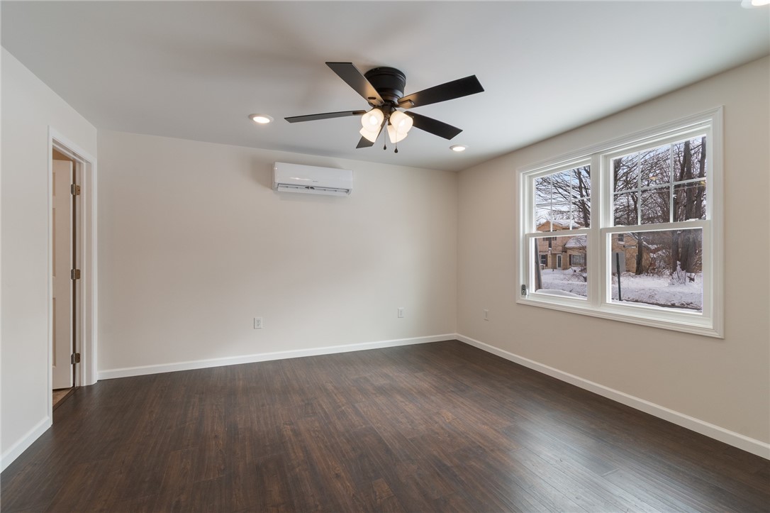 52 State Street Sodus, NY 14551 - Photo 7 of 29 Spacious front room- adjacent half bath and FULL l