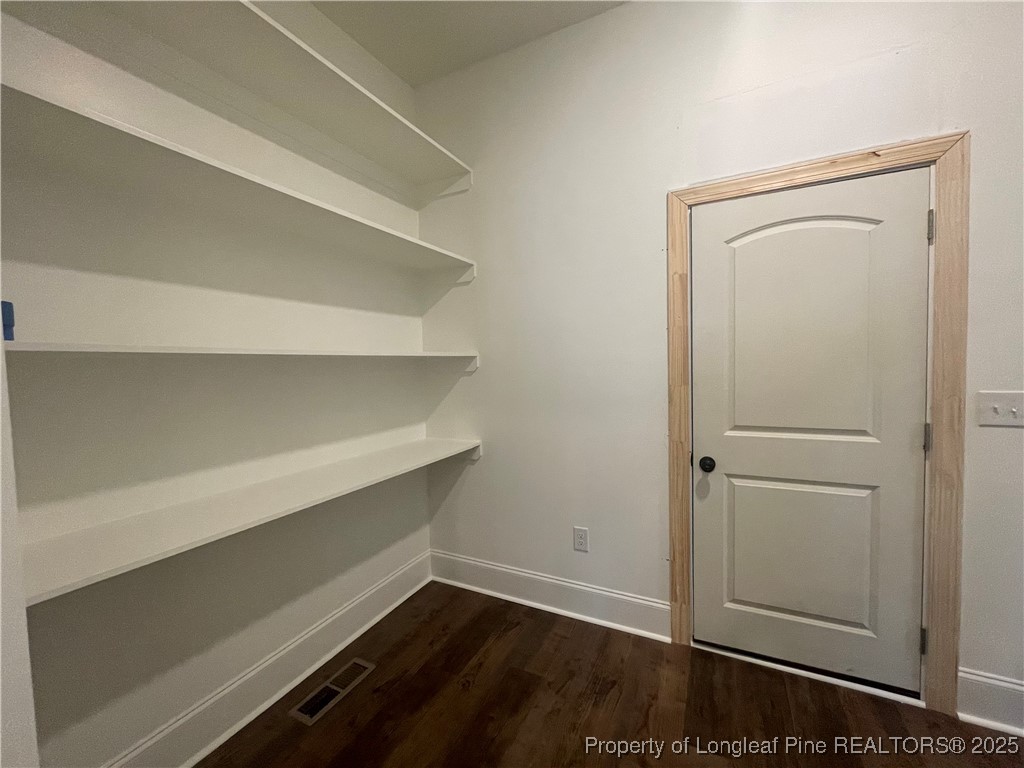 484 Falling Water Road Spring Lake, NC 28390 - Photo 13 of 18 a view of an empty walk in closet