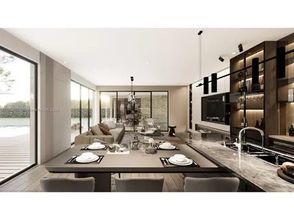 a kitchen with a sink and large window