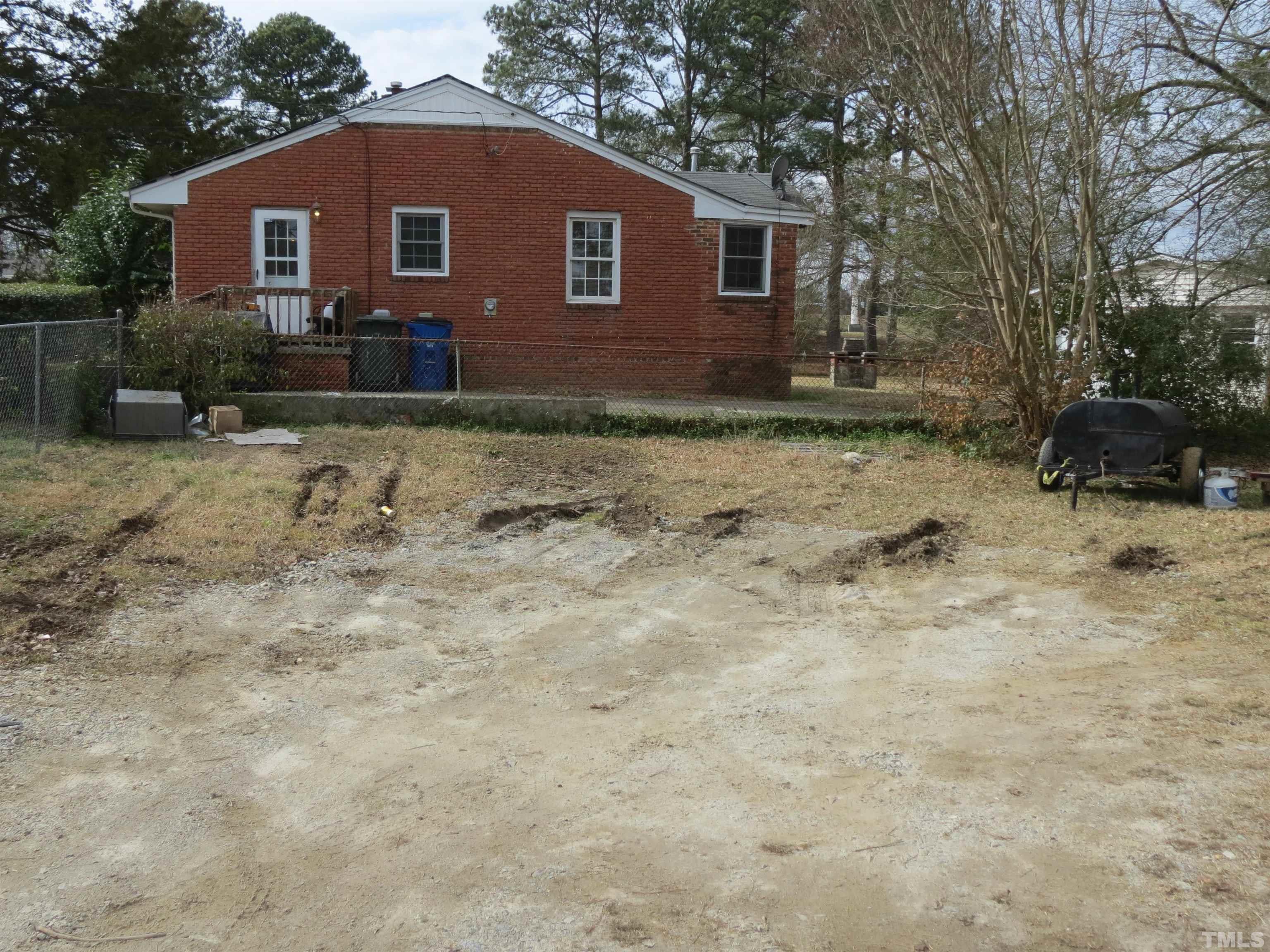 1816 Charles Street Raleigh, NC 27610 - Photo 4 of 4 a front view of a house with a yard