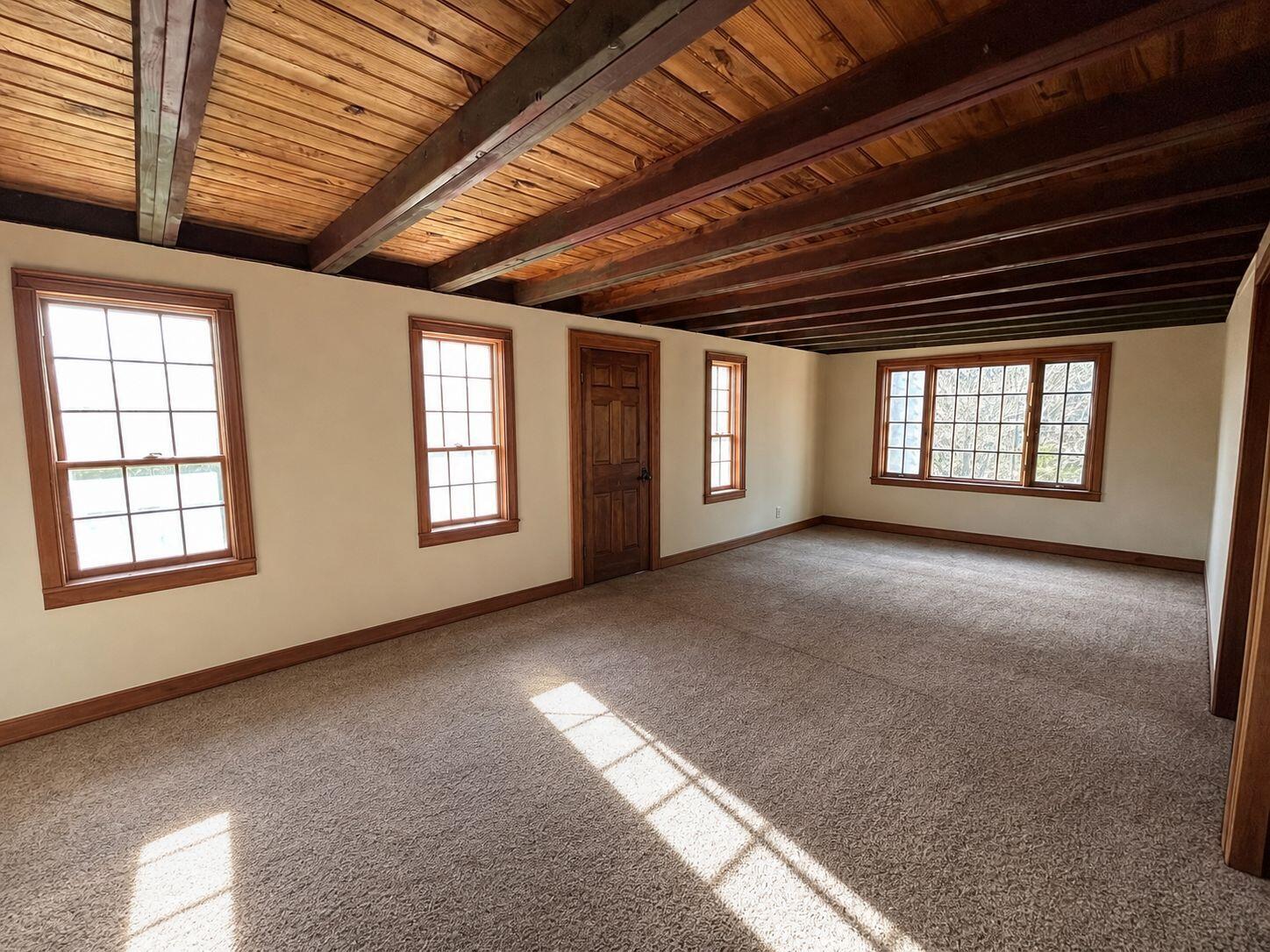 10 Benson Road Truro, MA 02666 - Photo 12 of 36 a view of an empty room with windows