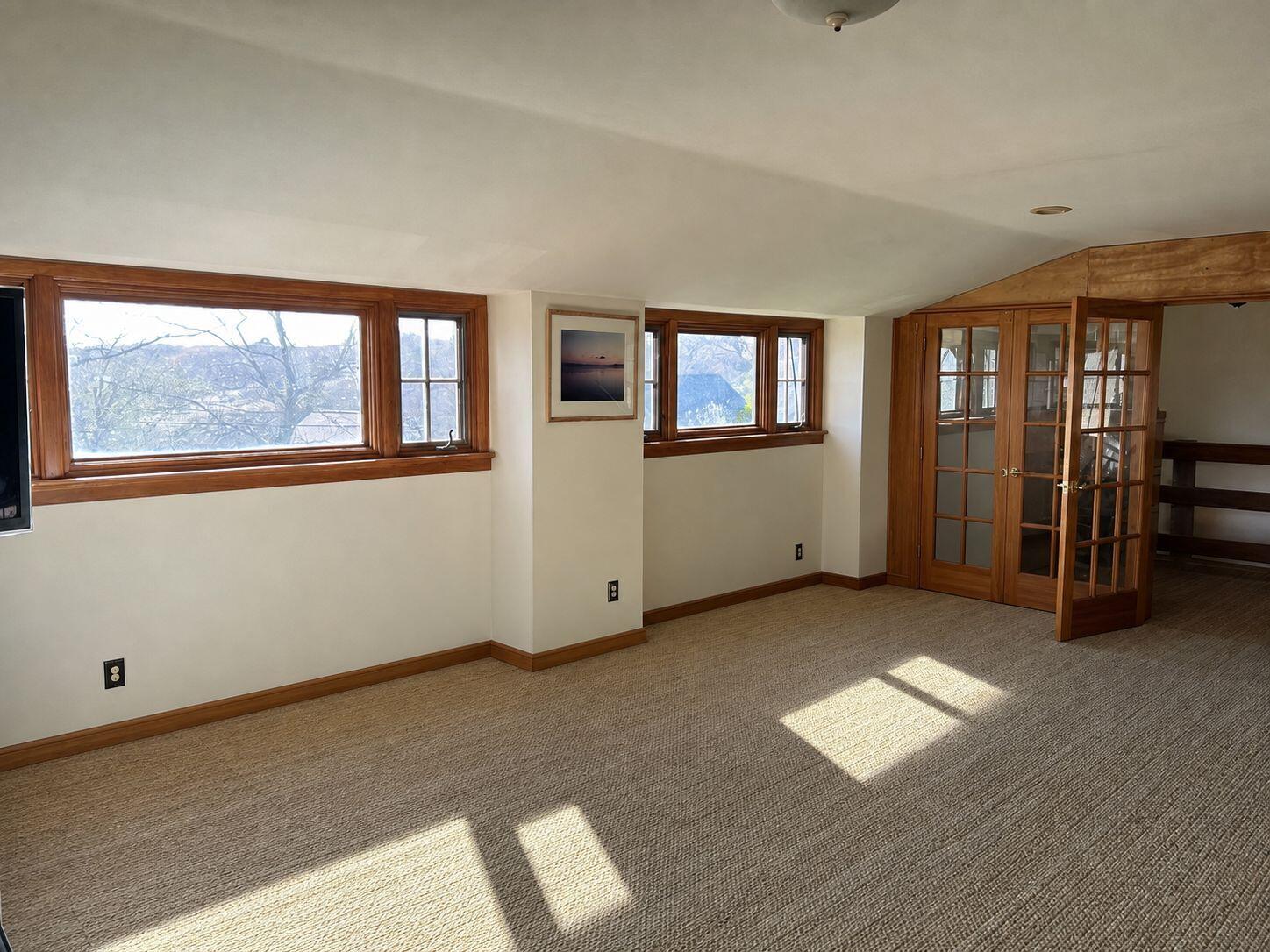 10 Benson Road Truro, MA 02666 - Photo 7 of 36 an empty room with windows