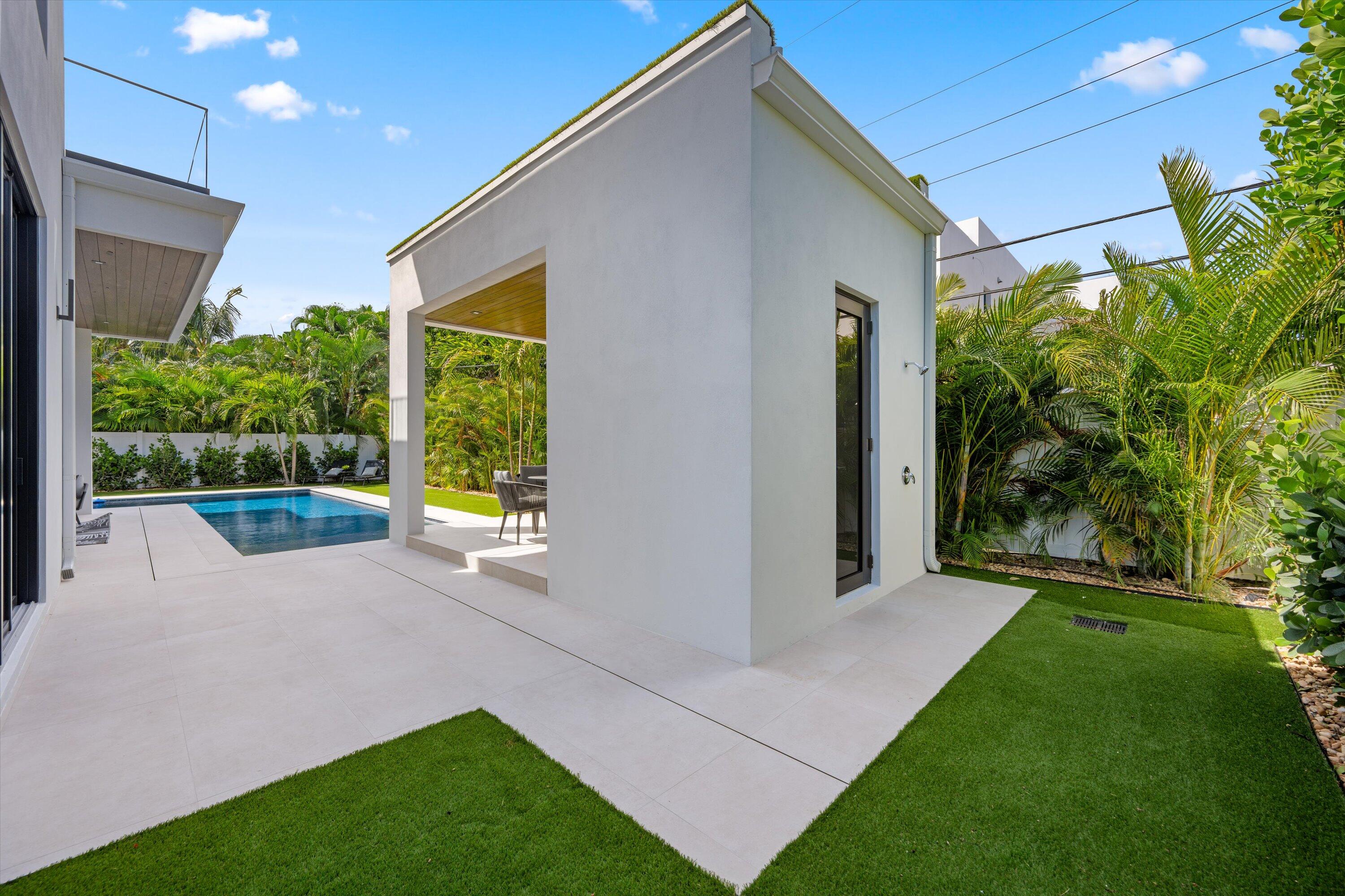 335 Northeast 5th Street Boca Raton, FL 33432 - Photo 47 of 47 cabana bath and outdoor shower