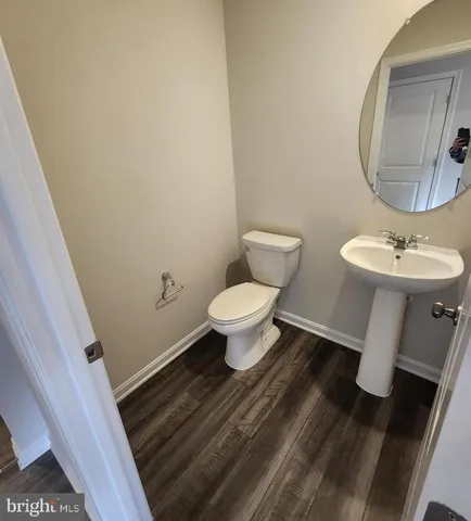 a view of balcony with wooden floor