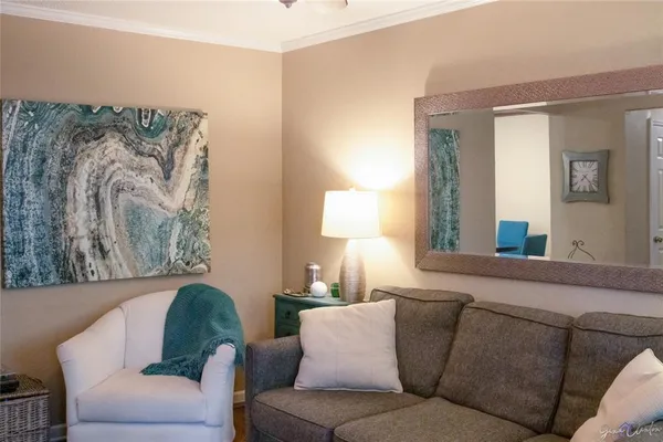 a living room with furniture and a window