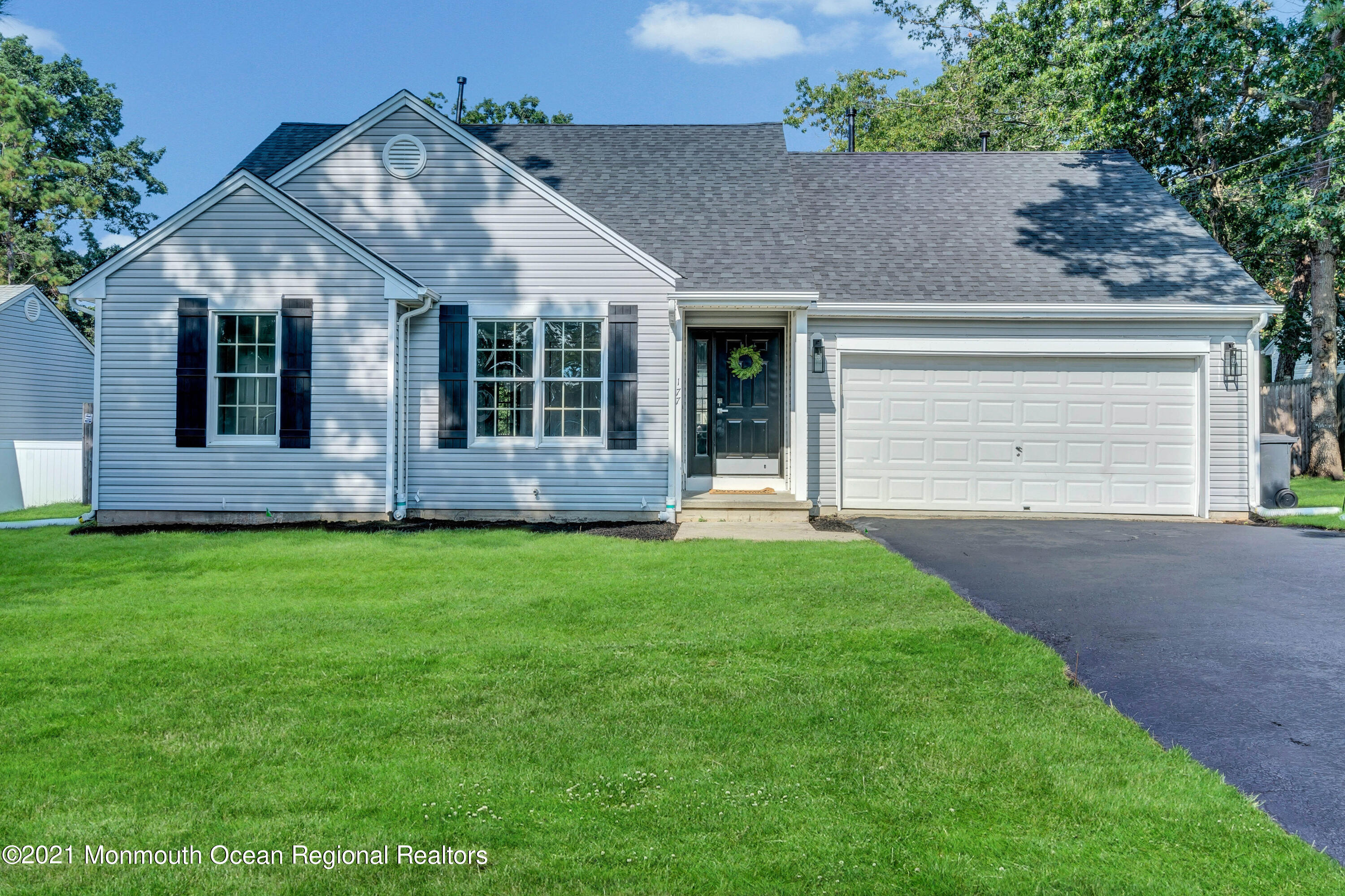 177 Topside Road Manahawkin, NJ 08050 - Photo 1 of 30 front view of a house with a yard