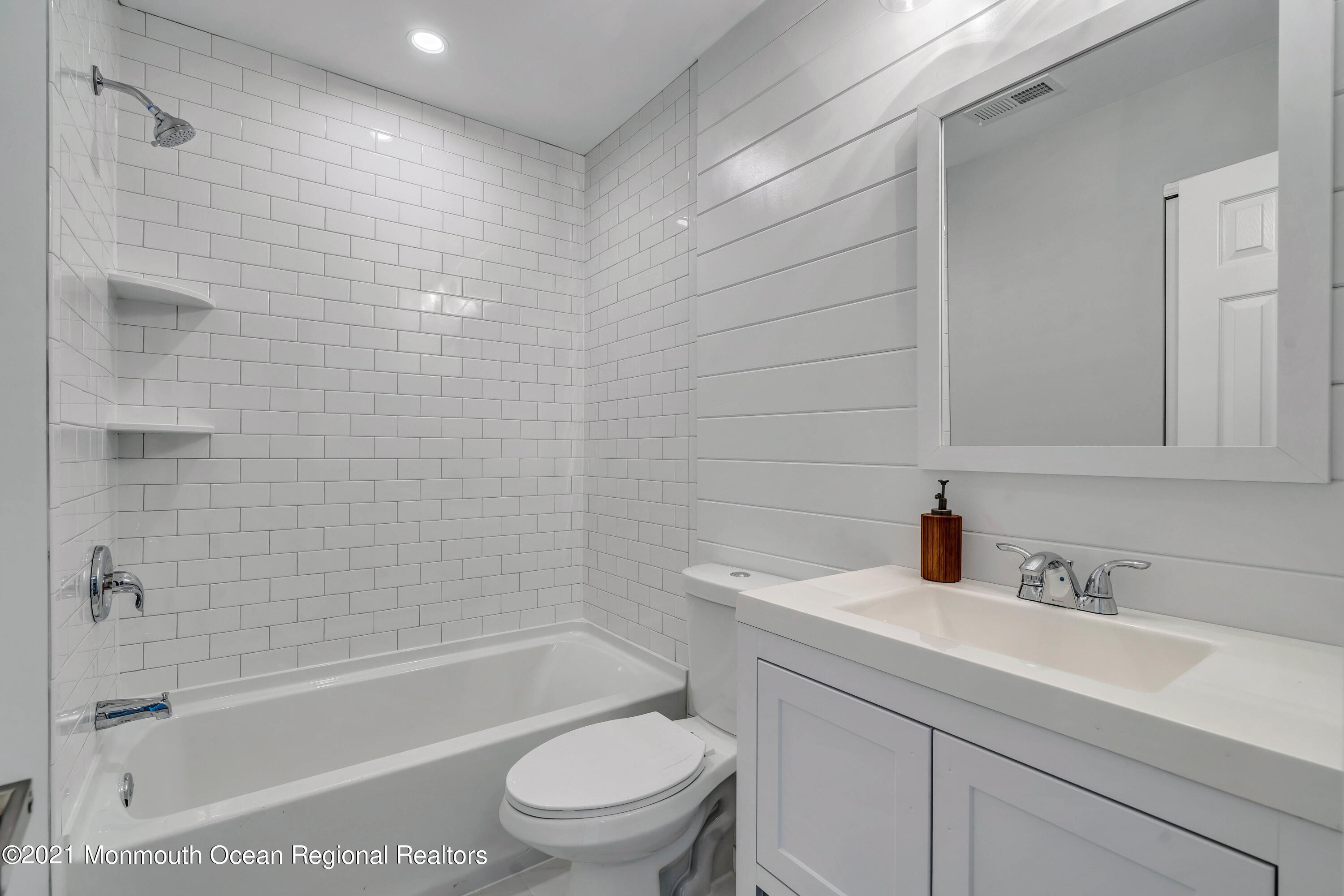177 Topside Road Manahawkin, NJ 08050 - Photo 17 of 30 a bathroom with a sink toilet and shower