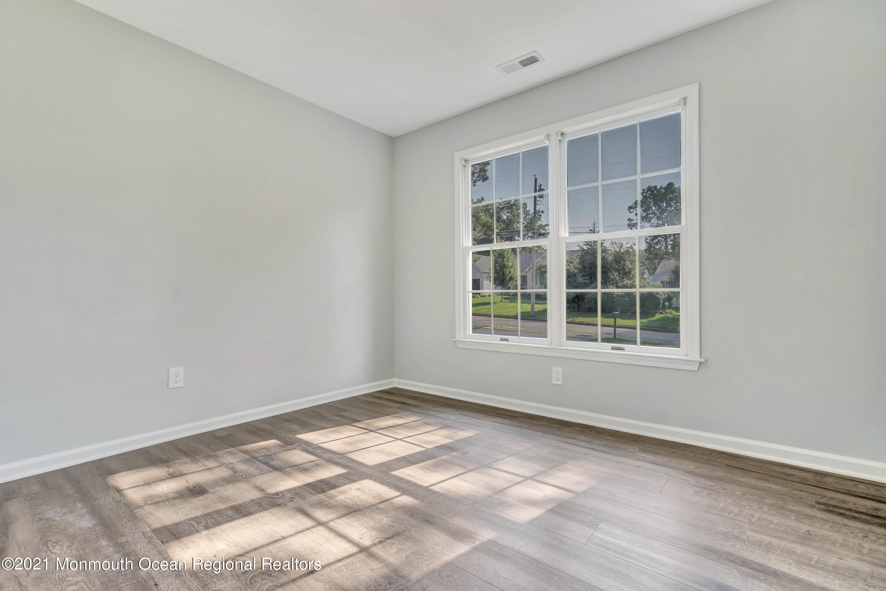 177 Topside Road Manahawkin, NJ 08050 - Photo 19 of 30 a view of empty room with windows