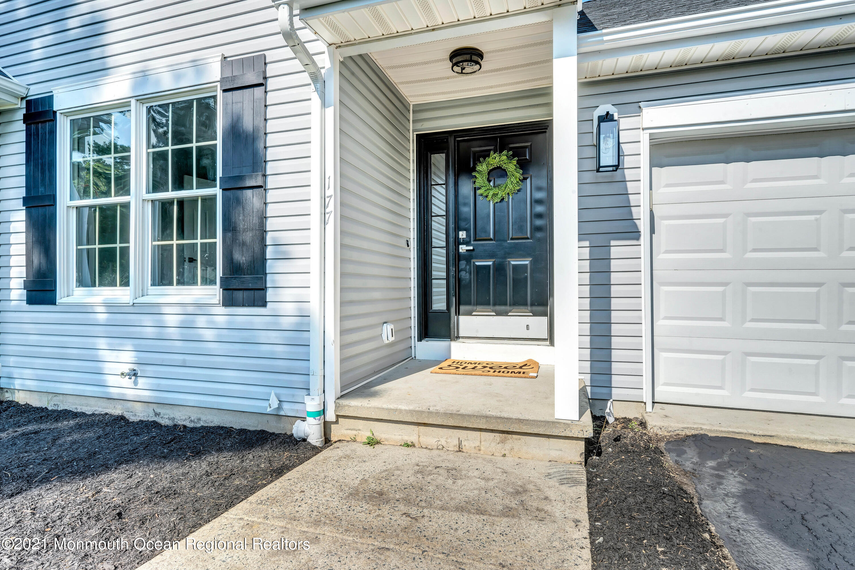 177 Topside Road Manahawkin, NJ 08050 - Photo 3 of 30 a view of a entryway door front of house
