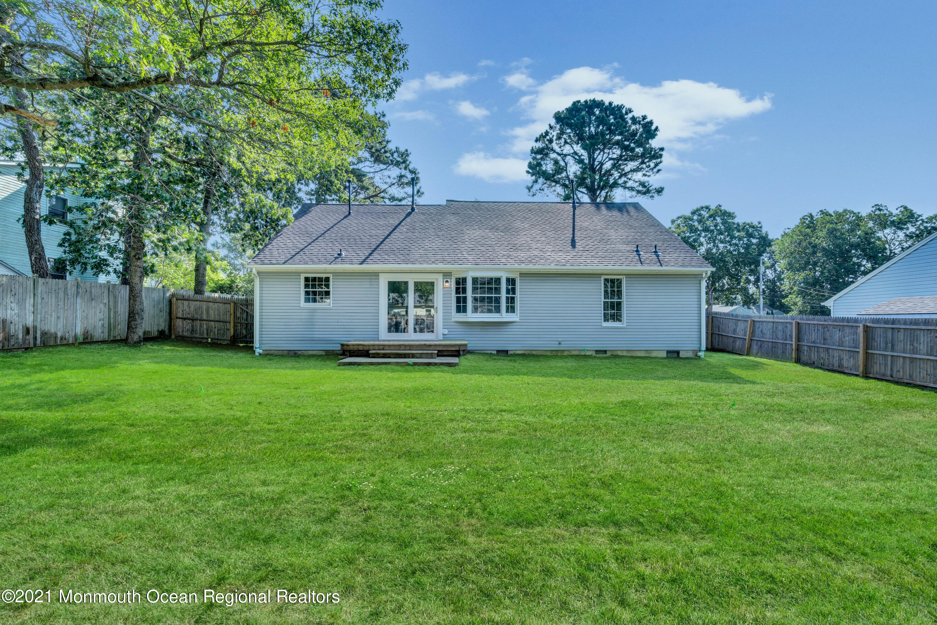 177 Topside Road Manahawkin, NJ 08050 - Photo 29 of 30 a outdoor view of a house with a garden
