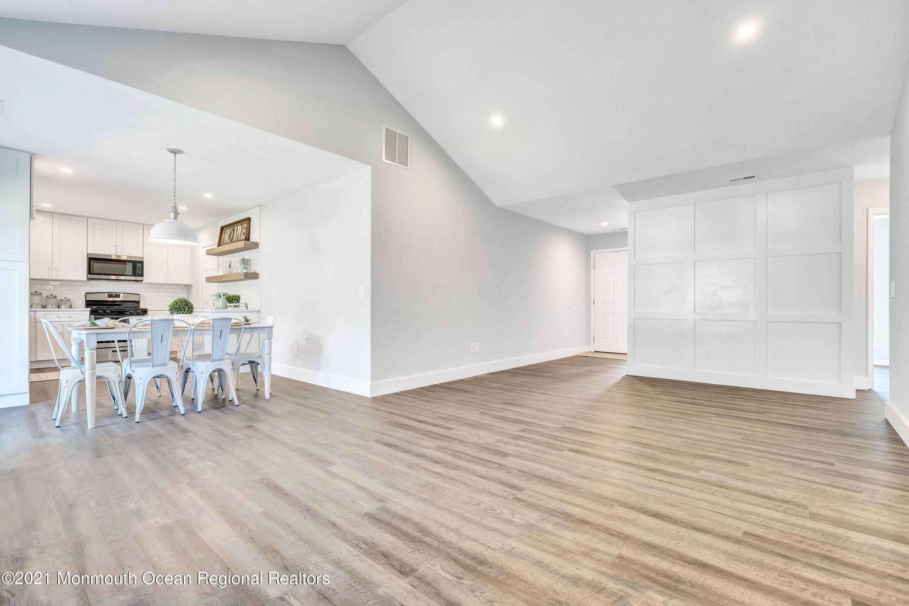 177 Topside Road Manahawkin, NJ 08050 - Photo 8 of 30 a view of kitchen and dining room with wooden floor