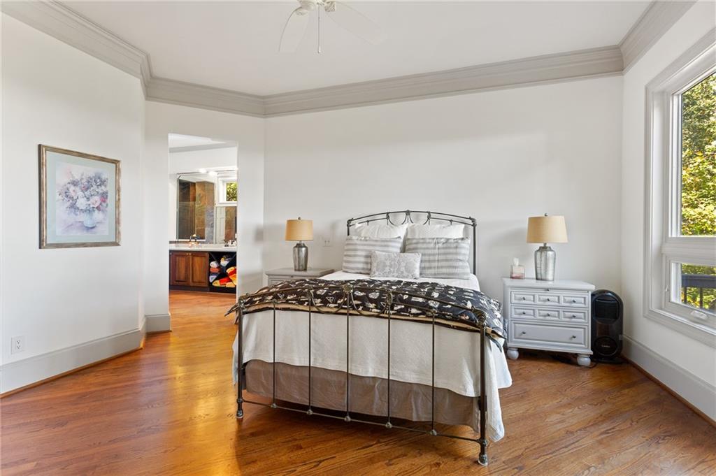 1319 Deer Run Ridge Jasper, GA 30143 - Photo 15 of 67 a bedroom with a bed and wooden floor