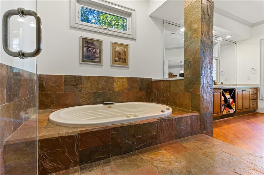 1319 Deer Run Ridge Jasper, GA 30143 - Photo 19 of 67 a bathroom with a sink and a mirror