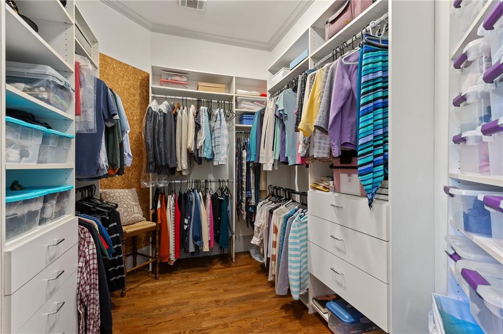 1319 Deer Run Ridge Jasper, GA 30143 - Photo 21 of 67 a view of walk in closet with clothes and shoes