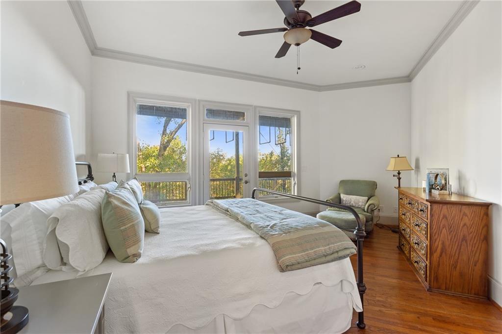 1319 Deer Run Ridge Jasper, GA 30143 - Photo 40 of 67 a bedroom with a bed and wooden floor