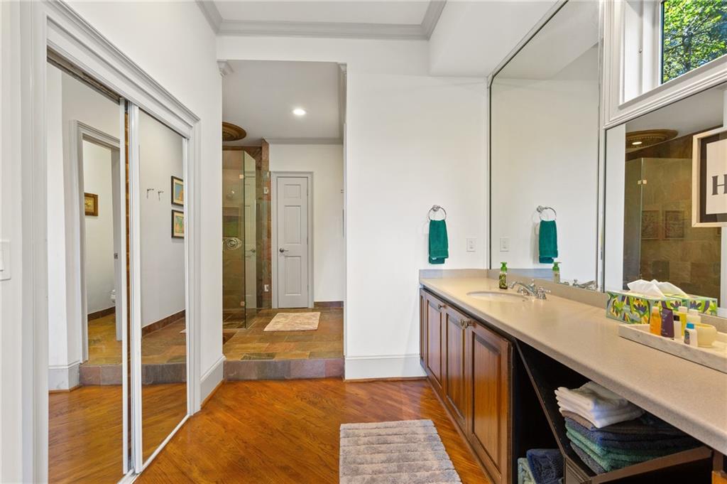 1319 Deer Run Ridge Jasper, GA 30143 - Photo 41 of 67 a bathroom with a double vanity sink and a mirror
