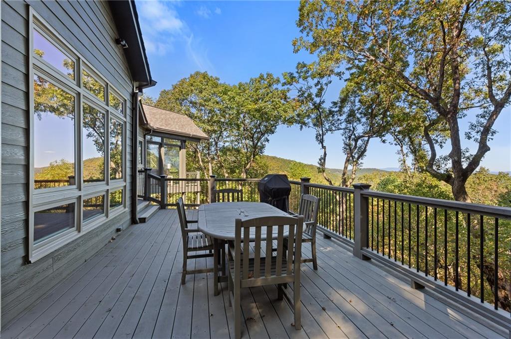 1319 Deer Run Ridge Jasper, GA 30143 - Photo 47 of 67 a view of a chairs and table on the wooden floor