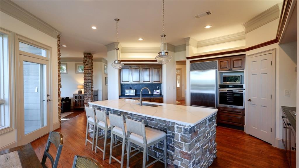 1319 Deer Run Ridge Jasper, GA 30143 - Photo 5 of 67 a large kitchen with a table and chairs