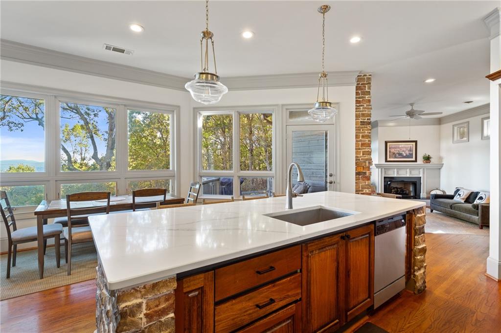 1319 Deer Run Ridge Jasper, GA 30143 - Photo 8 of 67 a dining table with chairs and wooden floor