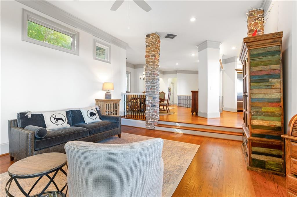 1319 Deer Run Ridge Jasper, GA 30143 - Photo 10 of 67 a living room with furniture and a chandelier
