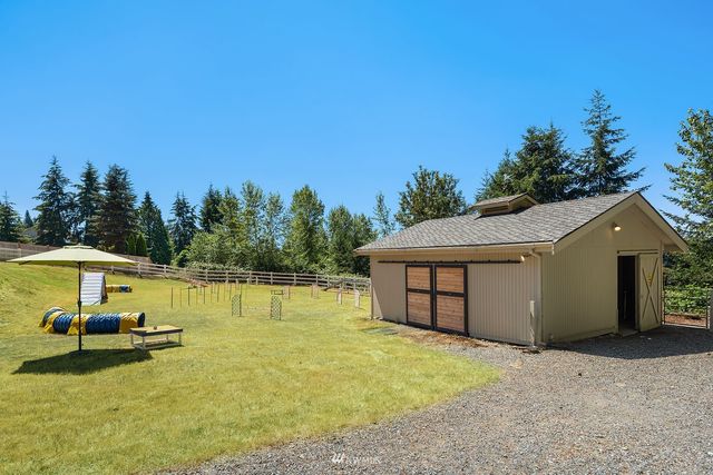 a view of a swimming pool with a lounge chair