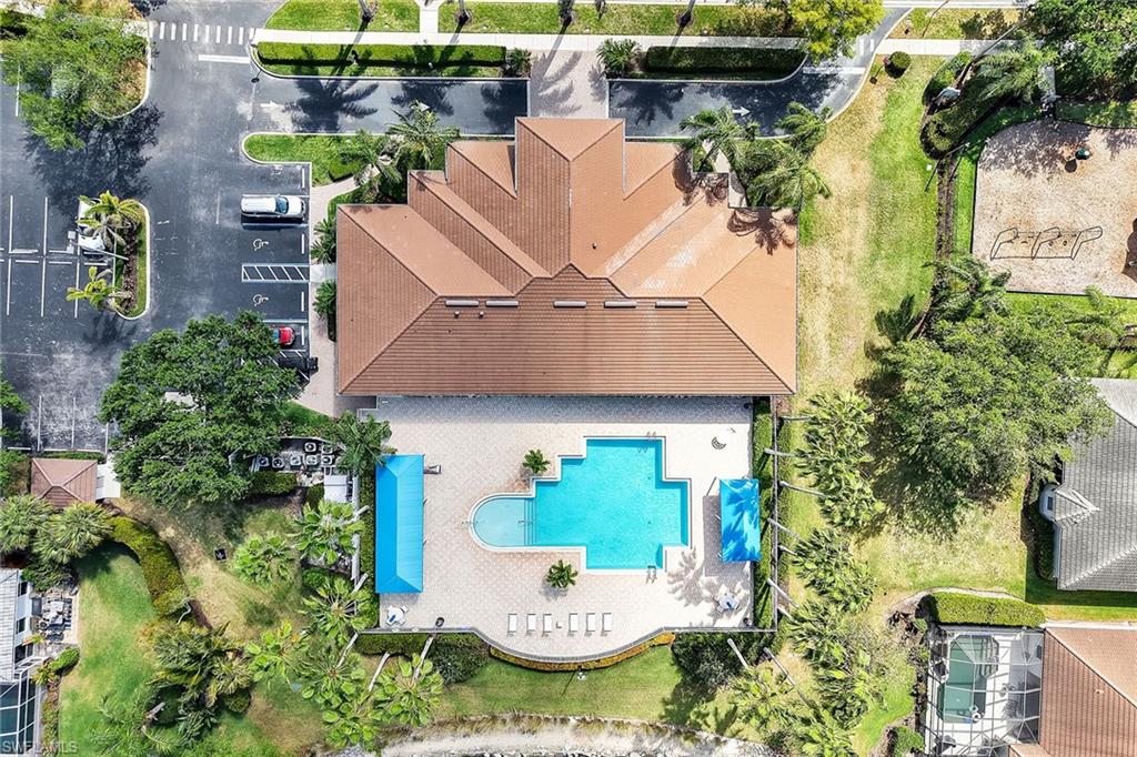 14611 Indigo Lakes Circle Naples, FL 34119 - Photo 29 of 31 an aerial view of a house with yard swimming pool and outdoor seating