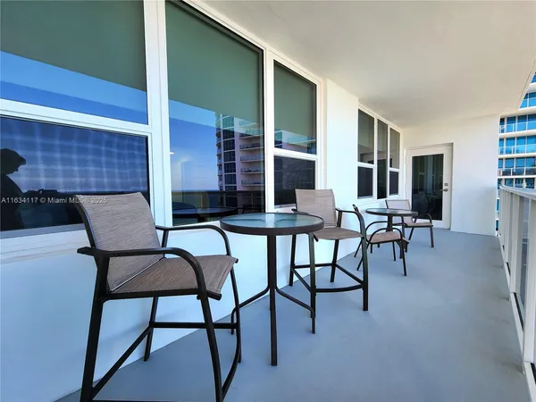 a view of a livingroom with furniture and window