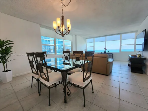 a view of a dining room with furniture