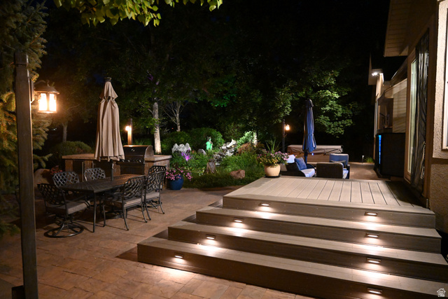 314 Brown Farm Lane Draper, UT 84020 - Photo 49 of 57 Multi-level outdoor living space featuring a paver patio and a composite deck with integrated stair lighting
