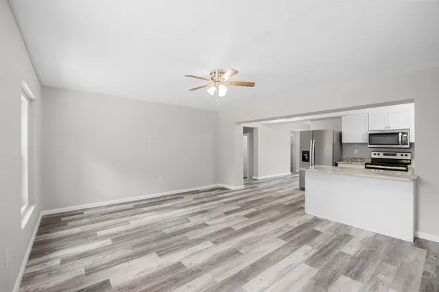 a view of kitchen and microwave