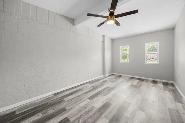 a view of empty room with windows