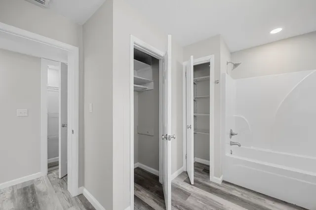 a view of room window and ceiling fan