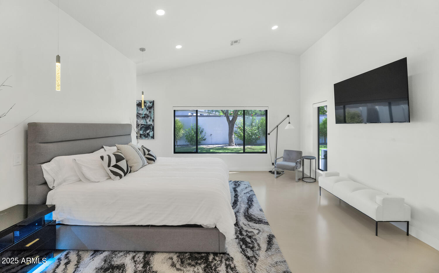 3420 East Oregon Avenue Phoenix, AZ 85018 - Photo 14 of 29 a bedroom with a bed and large window