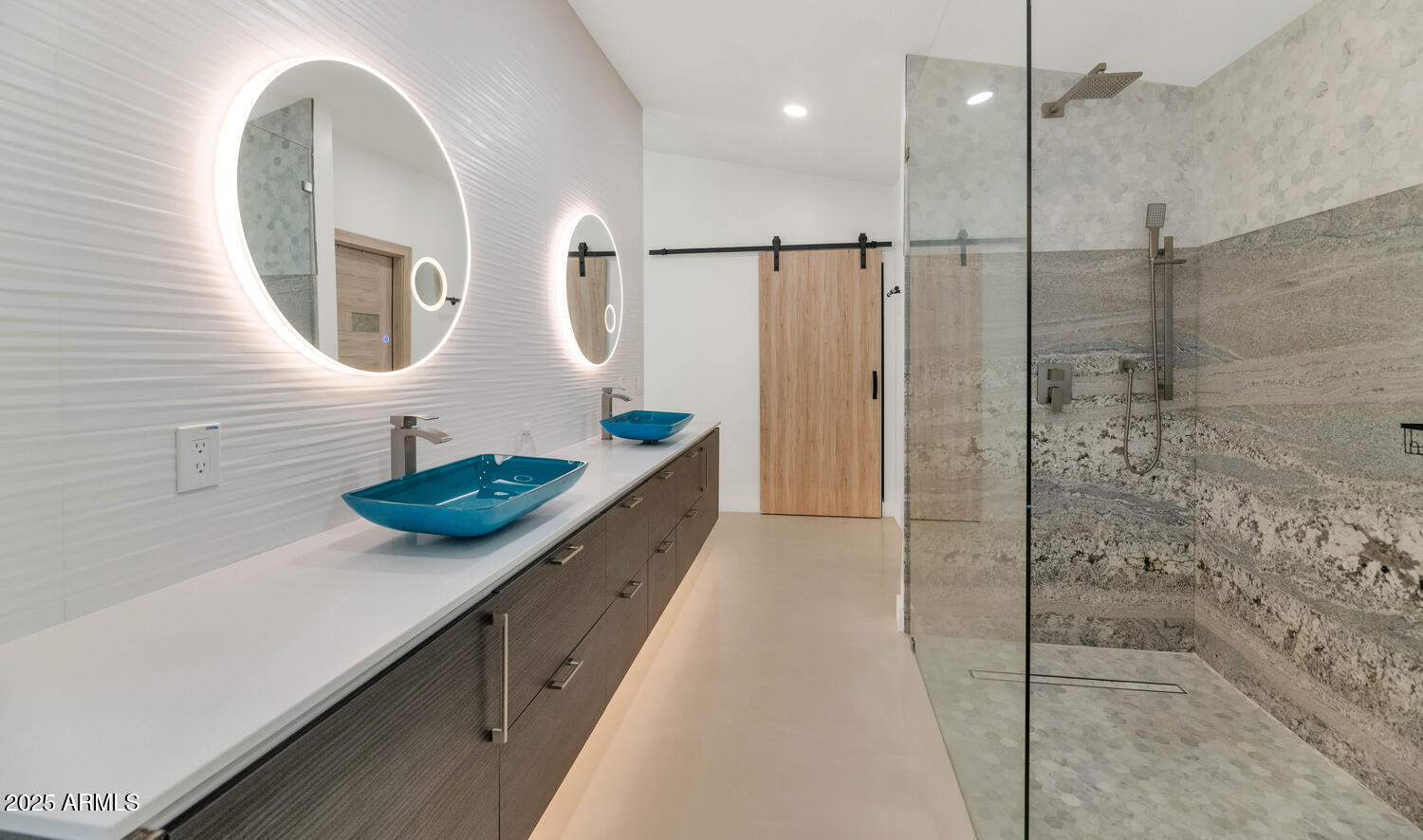 3420 East Oregon Avenue Phoenix, AZ 85018 - Photo 15 of 29 a bathroom with a sink and a mirror