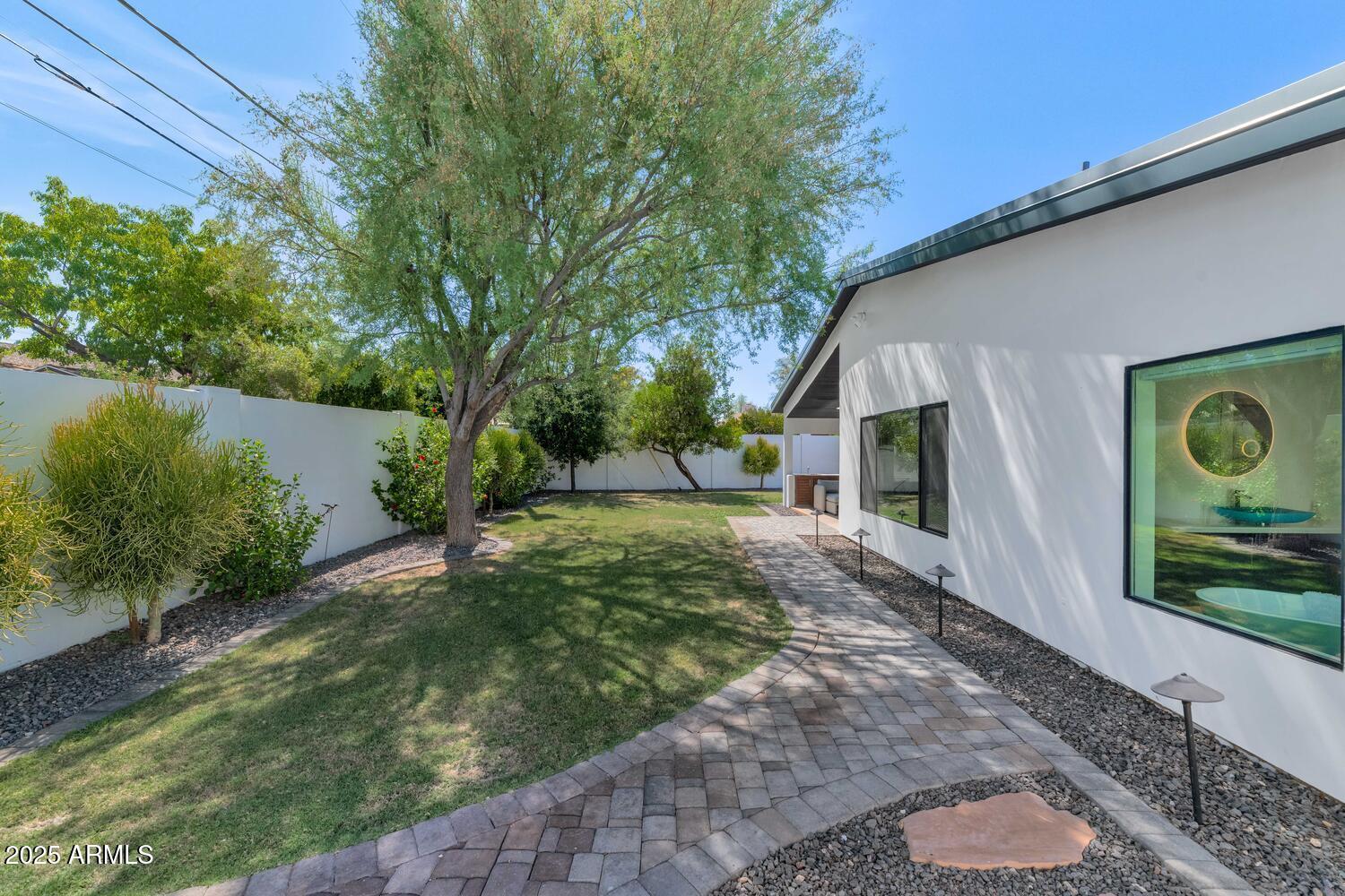 3420 East Oregon Avenue Phoenix, AZ 85018 - Photo 25 of 29 a view of a back yard of the house
