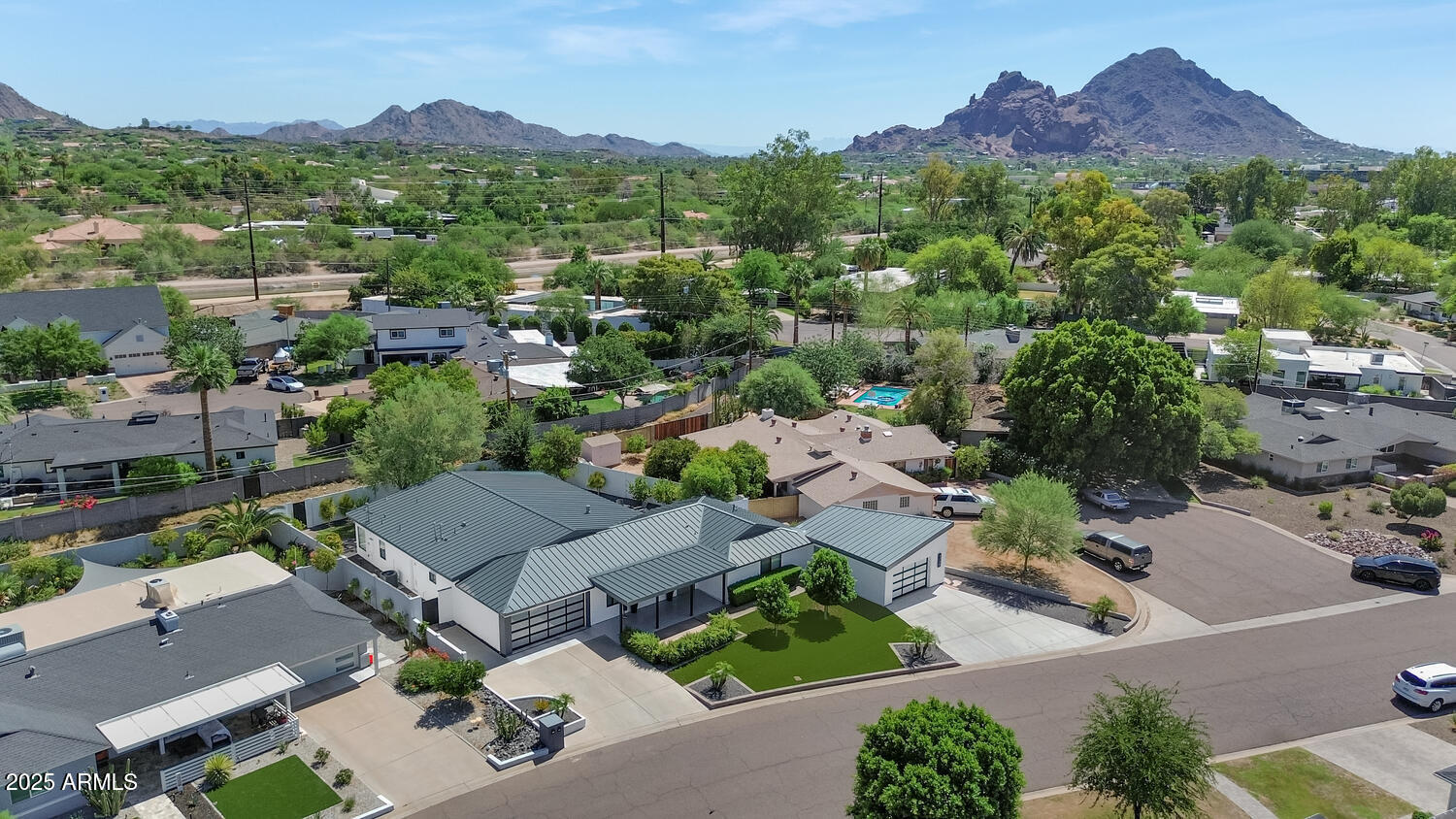 3420 East Oregon Avenue Phoenix, AZ 85018 - Photo 29 of 29 an aerial view of a city with lots of residential buildings