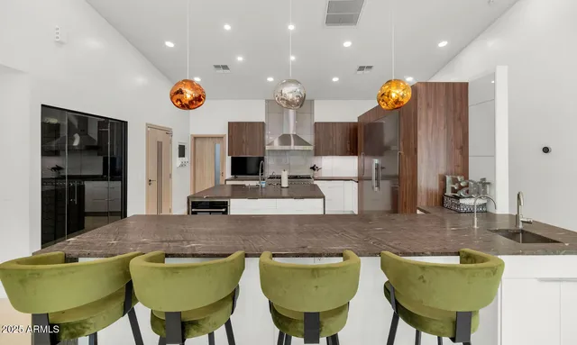 a view of kitchen and dining area with furniture
