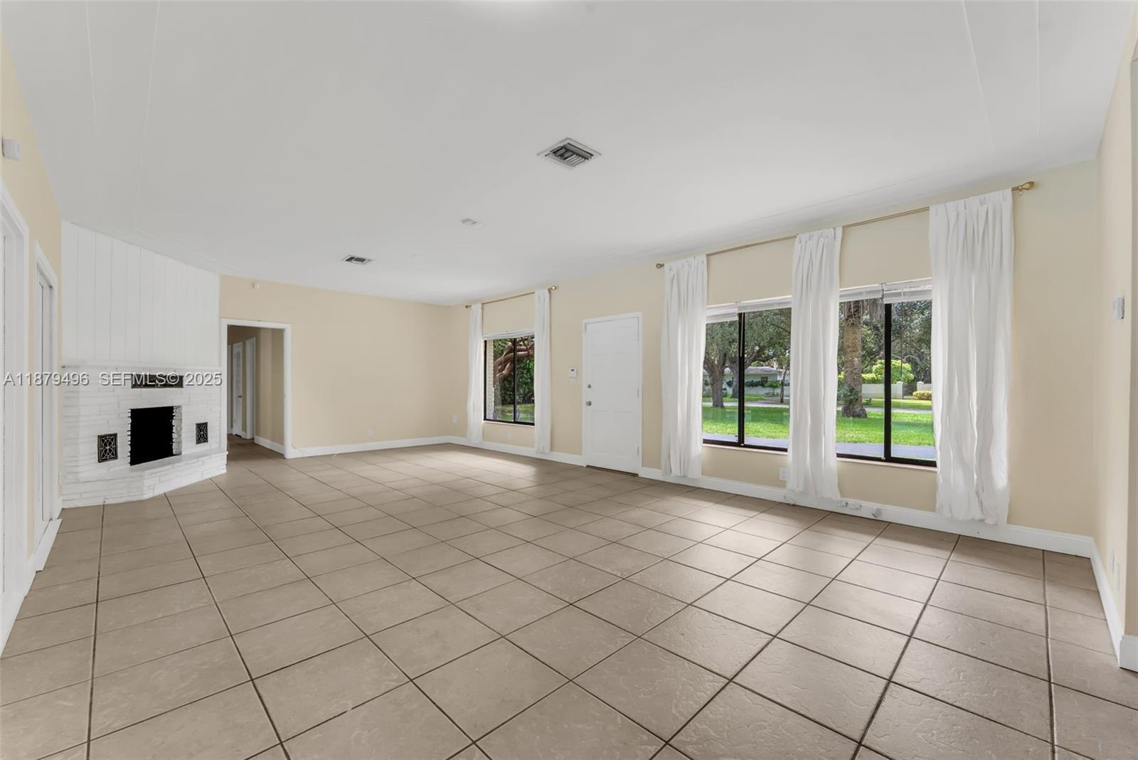 6275 Southwest 123rd Terrace Pinecrest, FL 33156 - Photo 13 of 49 a view of an empty room with a window