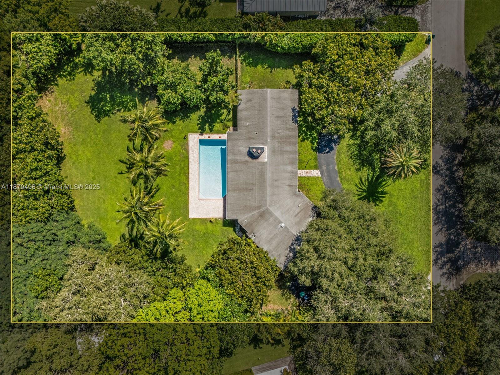 6275 Southwest 123rd Terrace Pinecrest, FL 33156 - Photo 36 of 49 an aerial view of a house with a yard