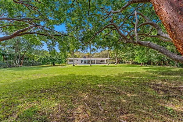 a view of a house with a big yard