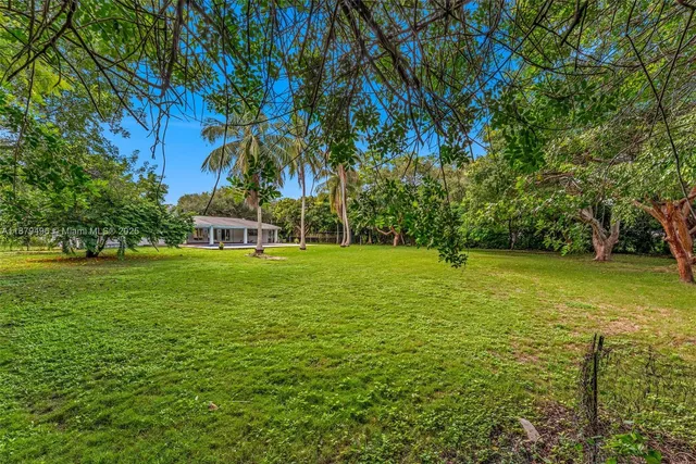 a view of a house with a big yard
